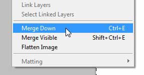 use the merge down command to merge two layers in photoshop cs5