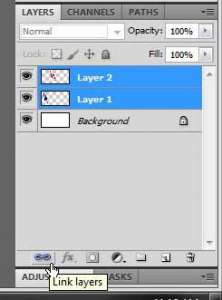 how to link two layers in photoshop cs5