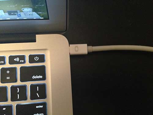 Connect the "Thunderbolt to HDMI adapter" to the Thunderbolt port on your MacBook Air