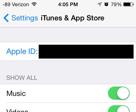 toque el botón ID de Apple en la parte superior de la pantalla