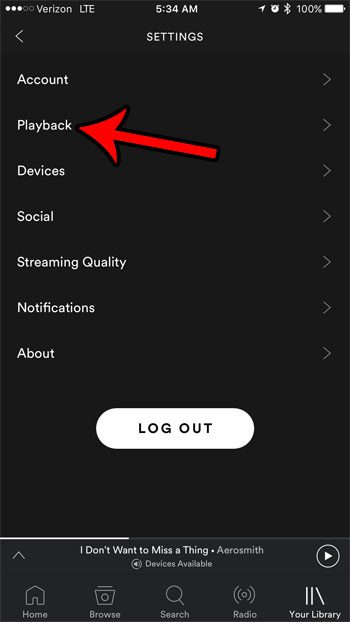 how to disable the behind the lyrics option in the iphone spotify app