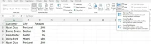 Excel worksheet with the top row frozen while scrolling, and the Freeze Panes menu open showing Unfreeze Panes